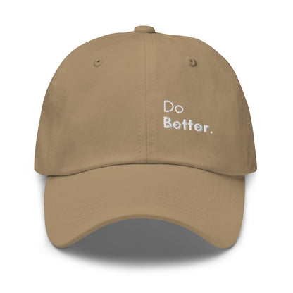 a beige or khaki hat with white sarcastic, do better, text on it