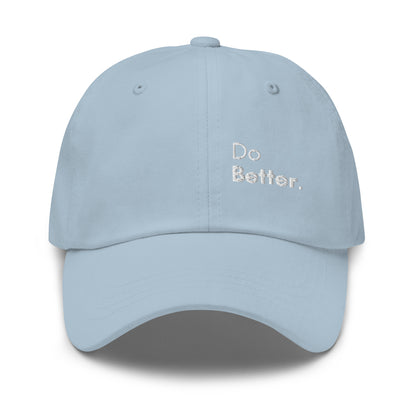 a light blue hat with white sarcastic, do better, text on it