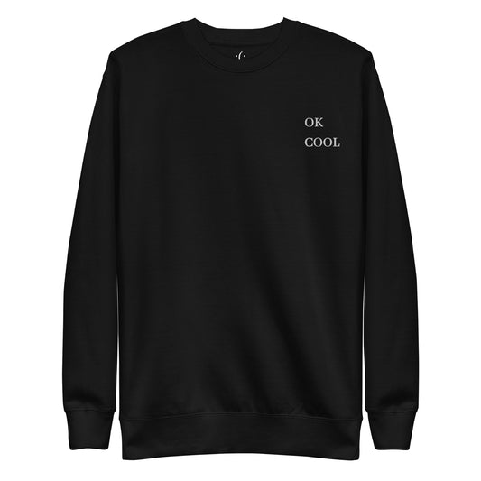 a black premium sweatshirt with sarcastic white, ok cool, text and smile on it