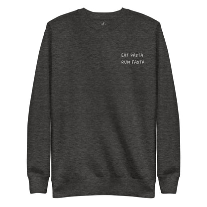 a charcoal heather premium sweatshirt with sarcastic white, eat pasta run fasta, text and smile on it