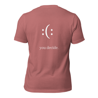 a mauve t-shirt with white sarcastic , you decide text and smile on it