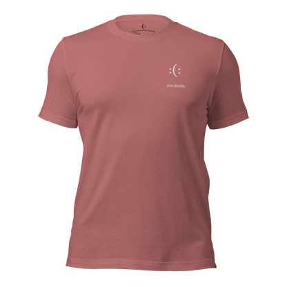 a mauve t-shirt with white sarcastic , you decide text and smile on it