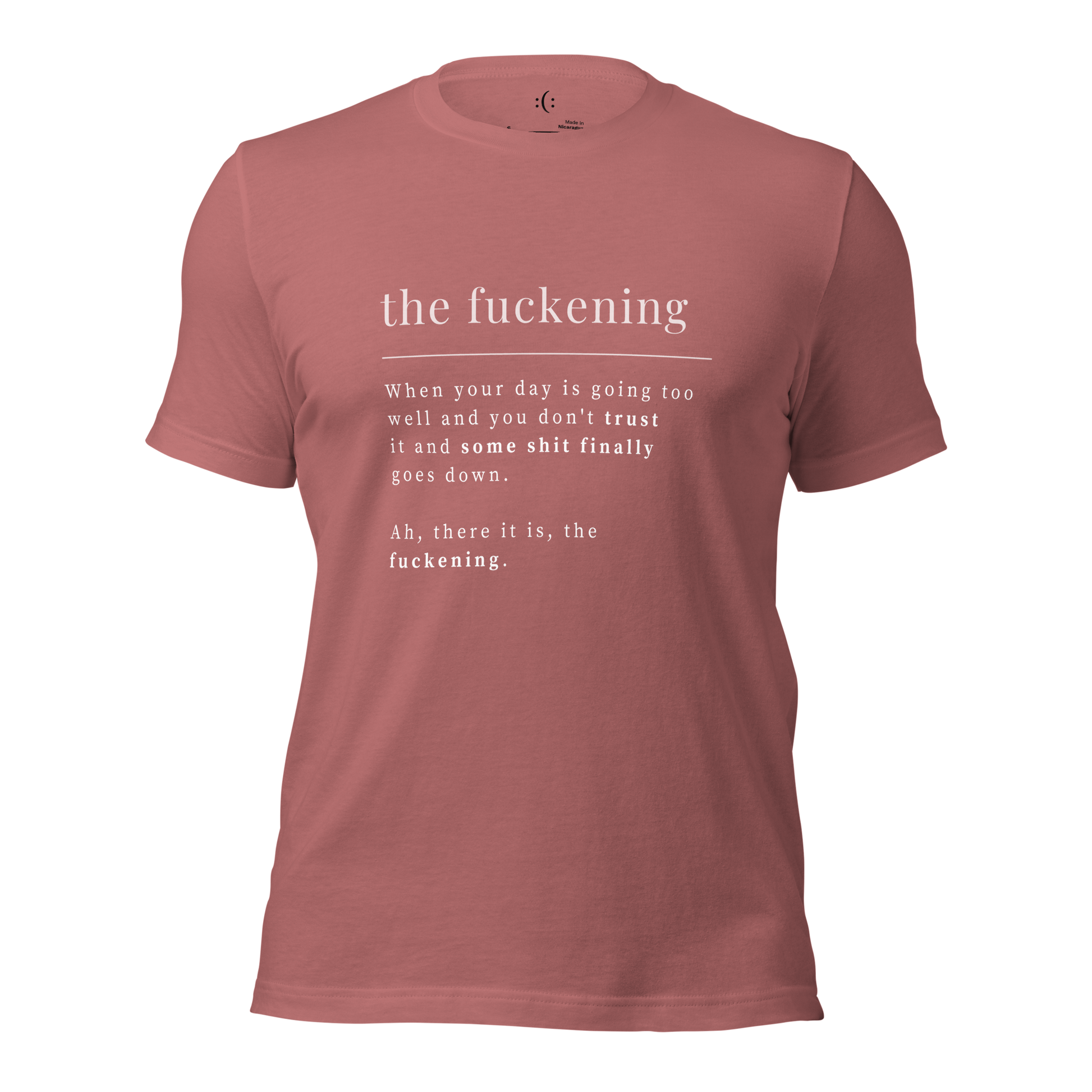 a mauve t-shirt with white sarcastic , the fuckening quote text and smile on it